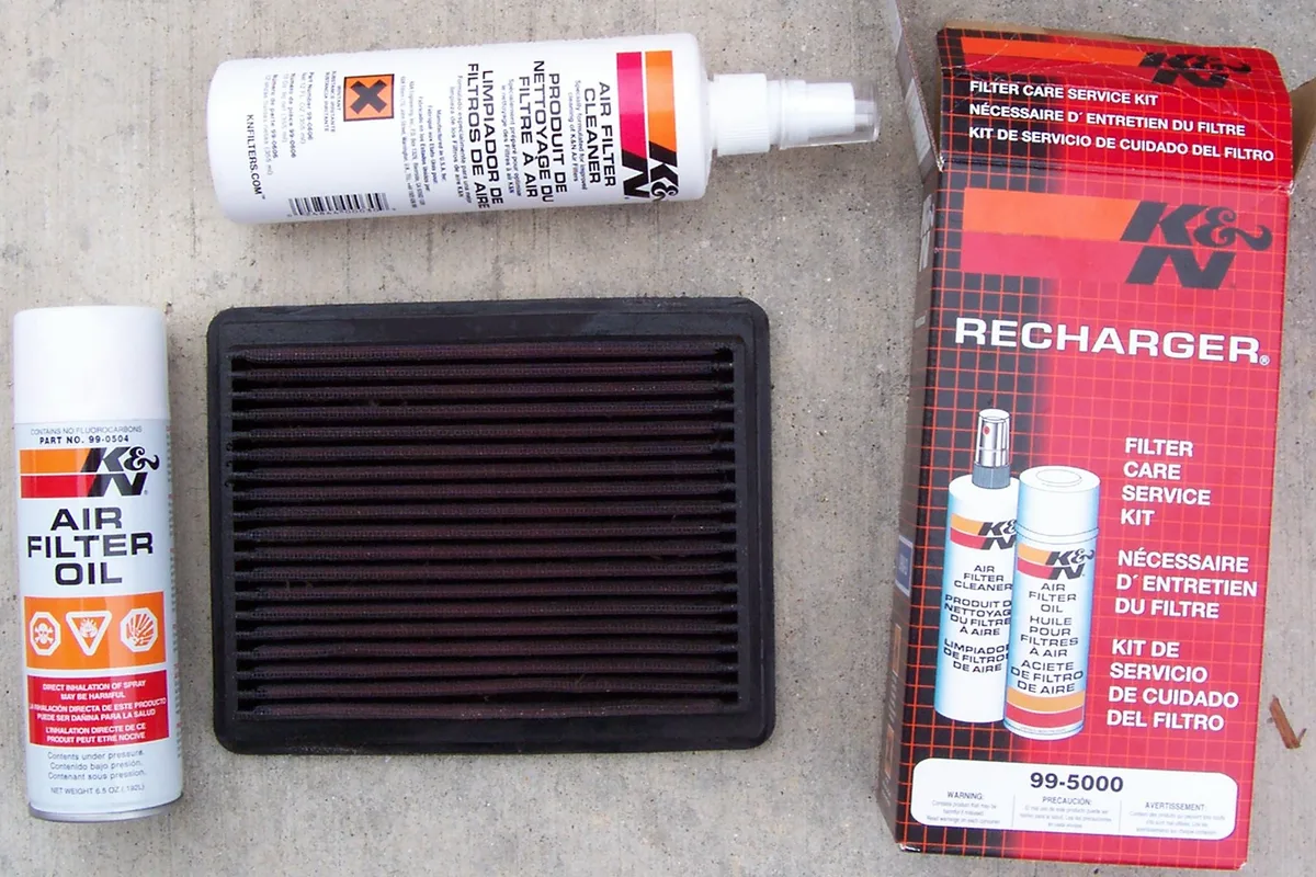 An air filter beside filter-cleaning and re-oiling supplies, shown as a category example.