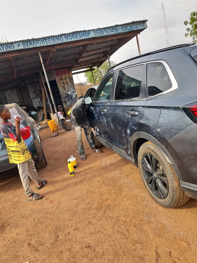 Car paint being polished after refinishing.